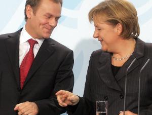Donald Tusk chce oczarować Angelę Merkel