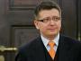 Prezydencki minister podróżował z handlarzem bronią