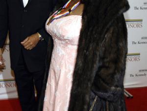 Legendary singer Aretha Franklin and escort arrive at the State Department dinner, during the the Annual Kennedy Center Honors Awards 2007, on Saturday Dec. 1, 2007 in Washington.AP PhotoJose Luis Magana