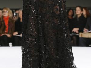 A model pauses on the runway during the presentation of Oscar de la Renta apos;s Pre-Fall 2008 fashion collection in New York, Monday, Dec. 3, 2007. AP PhotoKathy Willens