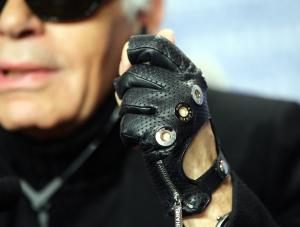 TO GO WITH AFP STORY BY SARAH SHARD
FILES This picture taken 10 February 2007 in Berlin shows German fashion designer Karl Lagerfeld during a press conference for his film  quot;Lagerfeld Confidential quot; presented in the Panorama programme of the 57th Berlinale Film Festival. Chanel apos;s designer Karl Lagerfeld recently put in an order for no fewer than 200 pairs, all made to his special specifications with just the last digit removed. AFP PHOTO DDPMICHAEL KAPPELER  GERMANY OUT